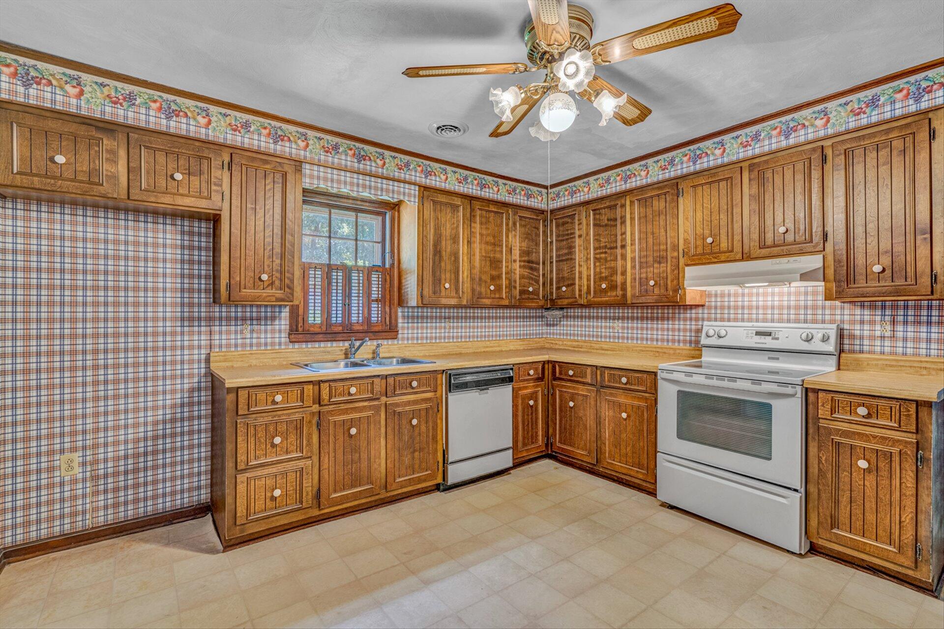 368 Foxcroft Drive Blue Ridge, VA 24064 - Photo 10 of 39 a kitchen with stainless steel appliances granite countertop a stove sink and cabinets