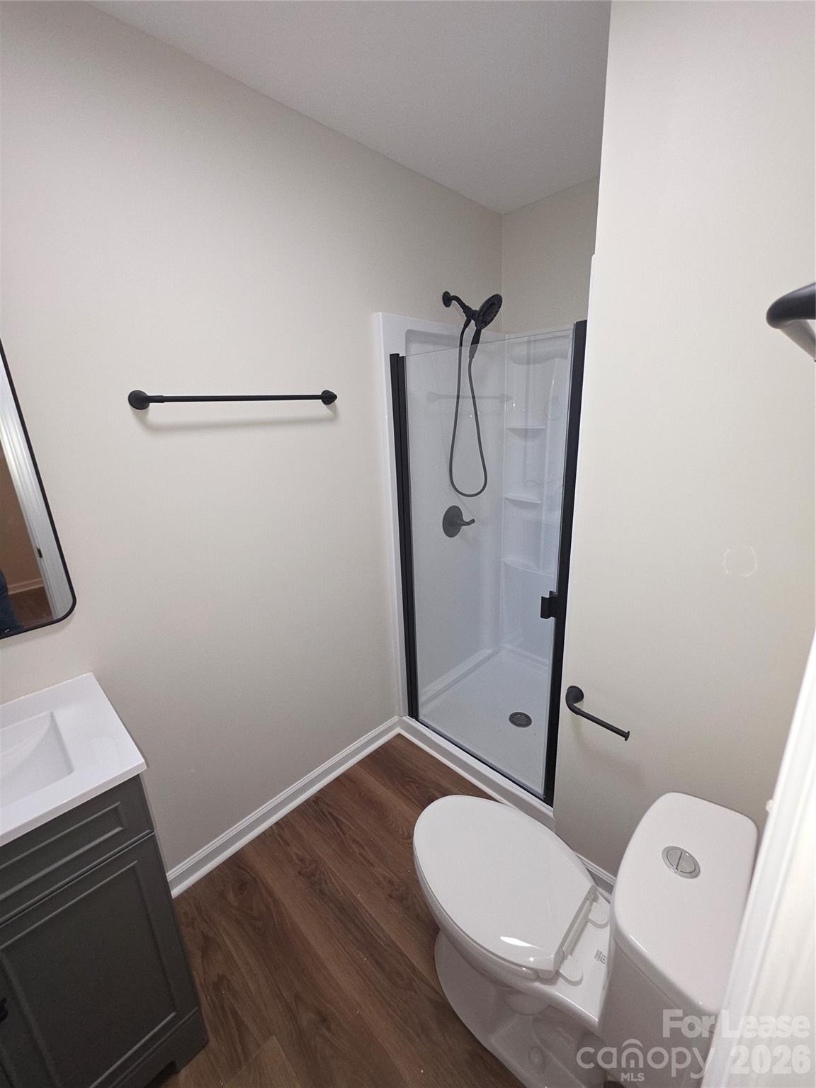 5710 Unionville Road Monroe, NC 28110 - Photo 14 of 18 a bathroom with a toilet and a shower