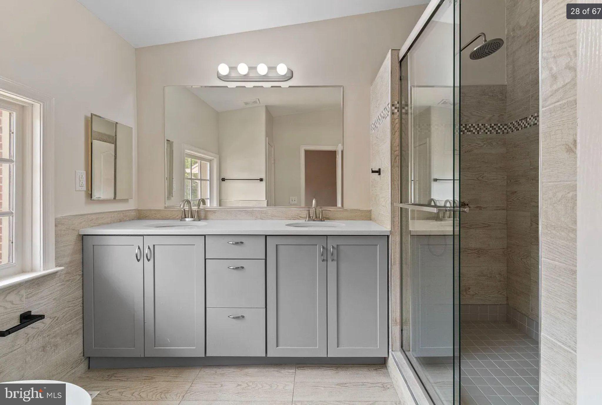 3906 Valley Ridge Drive Fairfax, VA 22033 - Photo 28 of 58 Sleek modern bathroom oasis.