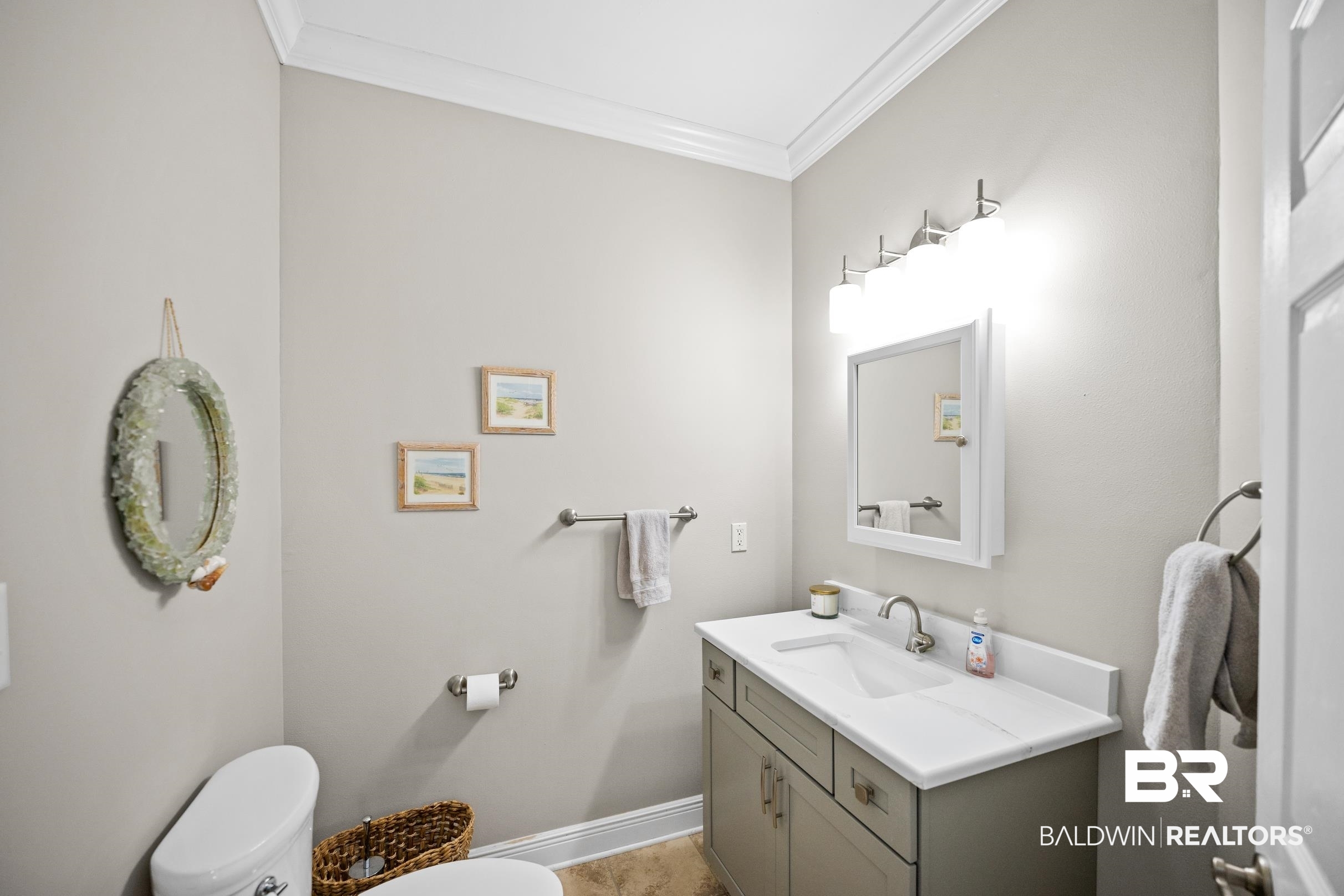 5217 Greentree Road Orange Beach, AL 36561 - Photo 53 of 58 Bathroom featuring vanity and ornamental molding