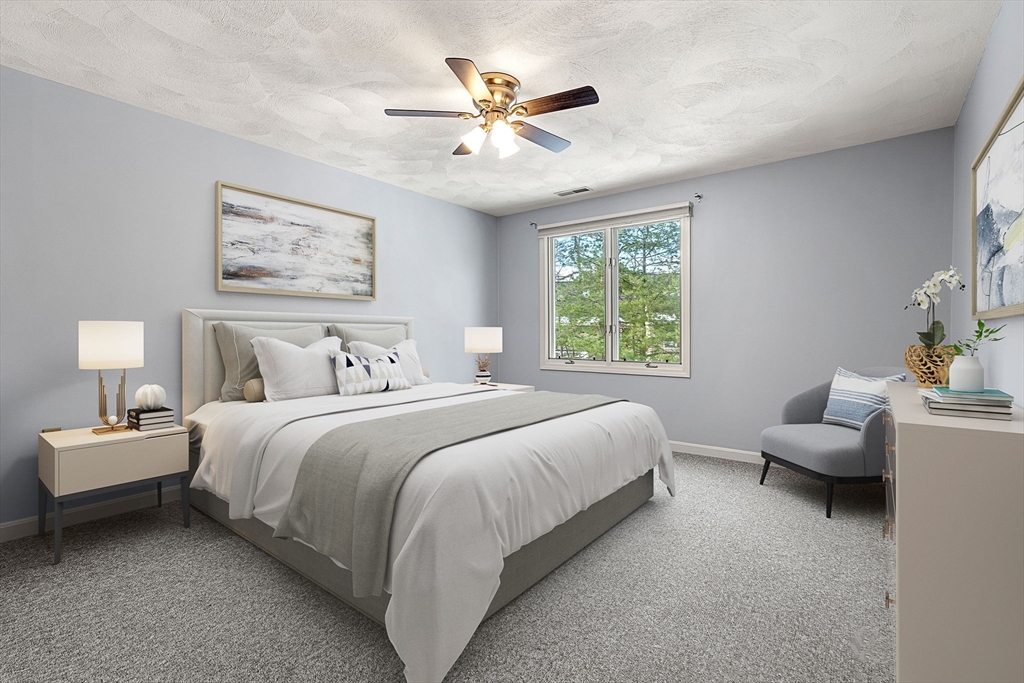 4 Iris Way, Unit 22 Haverhill, MA 01830 - Photo 12 of 38 a bedroom with bed and window
