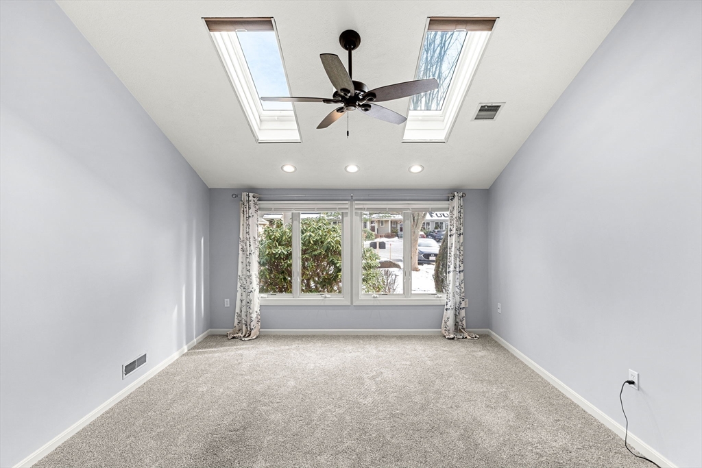 4 Iris Way, Unit 22 Haverhill, MA 01830 - Photo 24 of 38 a view of an empty room with a window