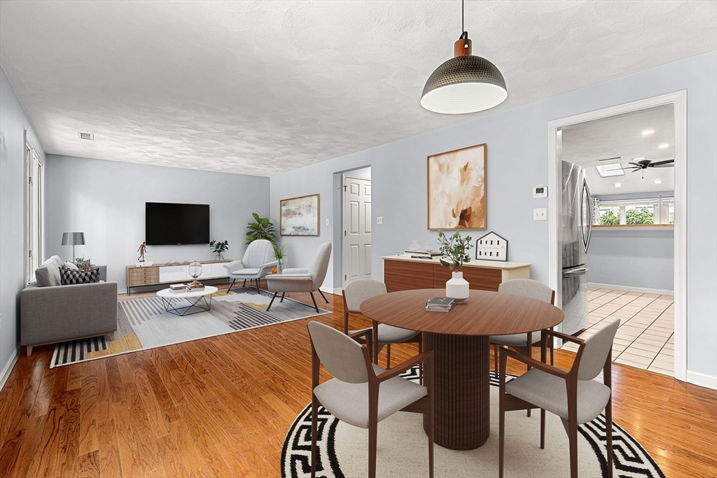4 Iris Way, Unit 22 Haverhill, MA 01830 - Photo 27 of 38 a view of a dining room with furniture