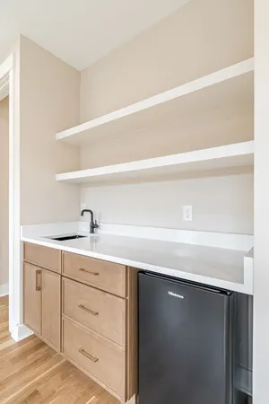 a bathroom with a sink double vanity and a mirror