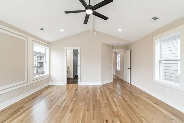 a bathroom with a granite countertop sink mirror and double
