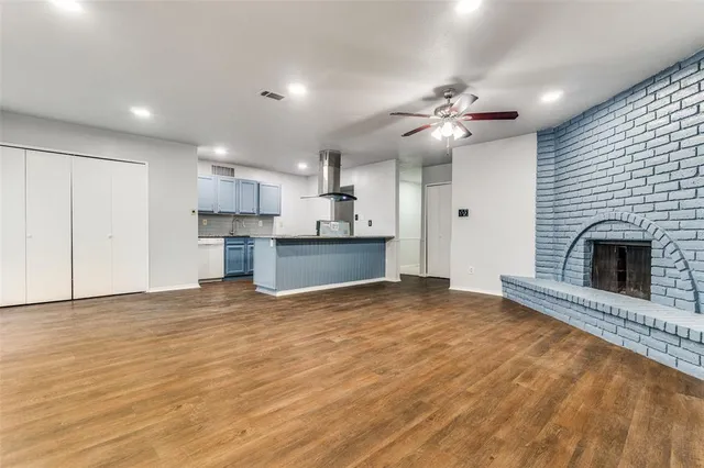 a view of a kitchen with a sink and a kitchen