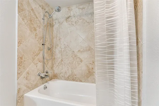 a bathroom with a bathtub