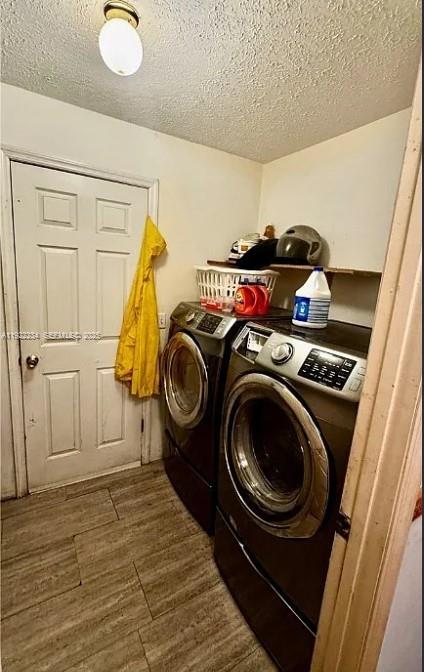 8055 Twitty Road Sebring, FL 33876 - Photo 14 of 19 a utility room with dryer and washer