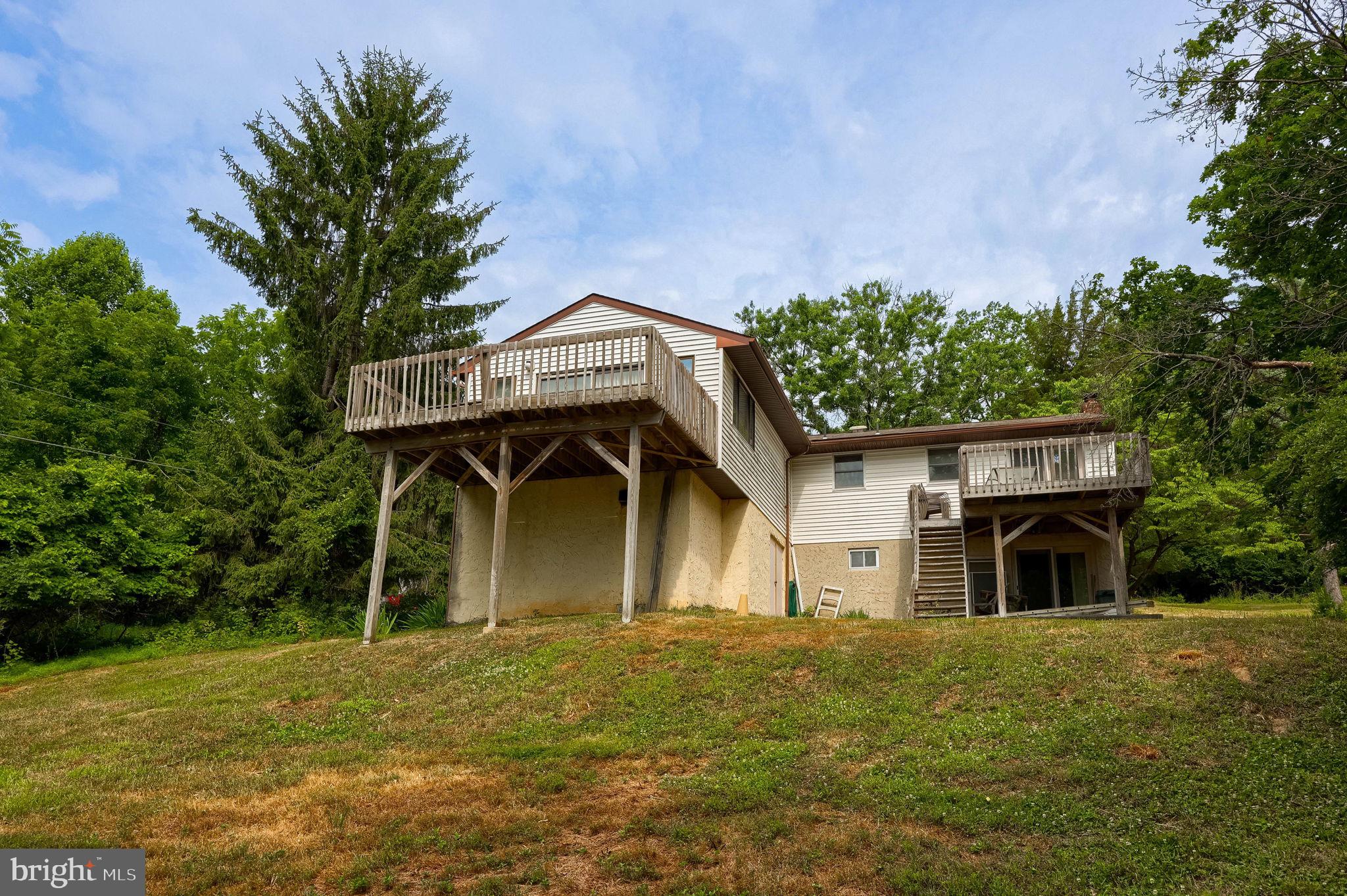 49 Preston Road Reading, PA 19608 - Photo 30 of 42 Charming hillside retreat with deck.