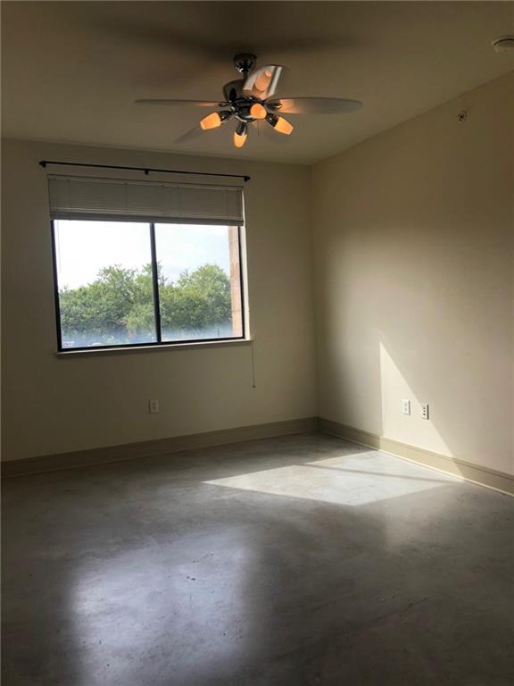 3016 Guadalupe Street, Unit 203 Austin, TX 78705 - Photo 11 of 16 a view of an empty room with a window