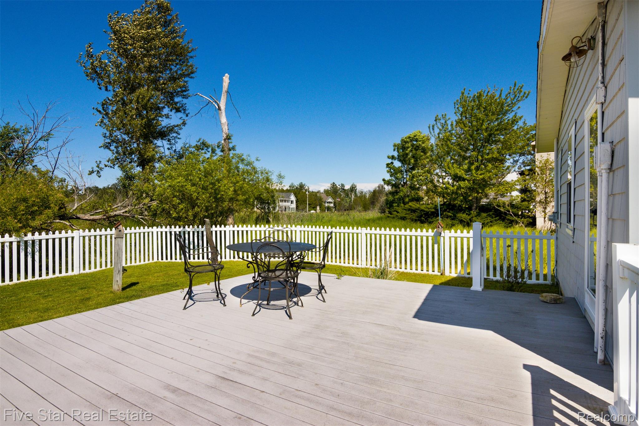 2588 Lakeview Road Onekama, MI 49675 - Photo 24 of 32 Spacious outdoor back deck