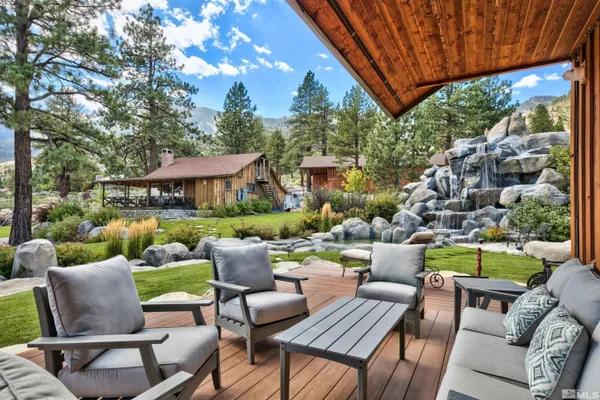 a patio with patio a table and chairs