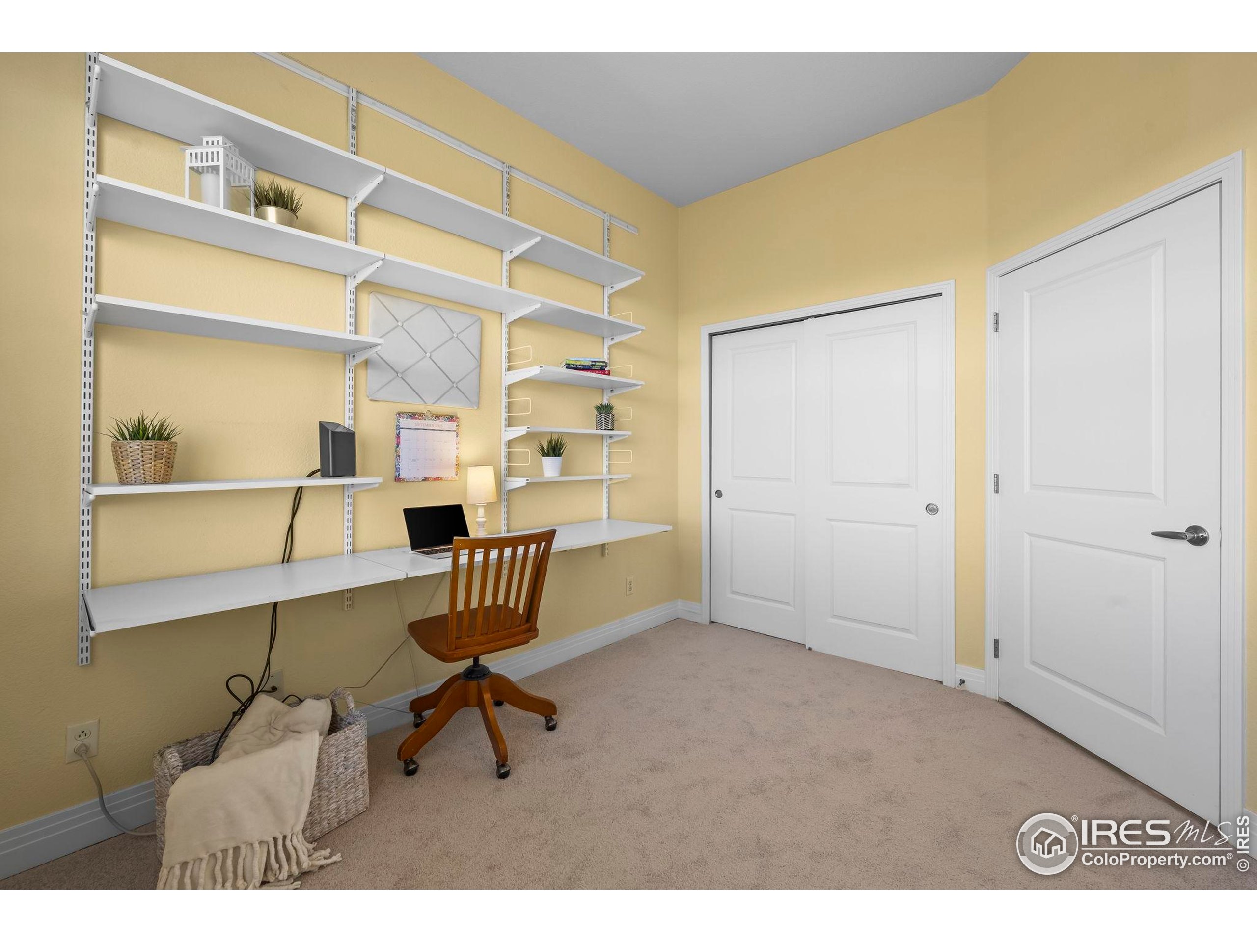 209 Quebec Street, Unit L Denver, CO 80220 - Photo 29 of 46 a view of a room with gym equipment