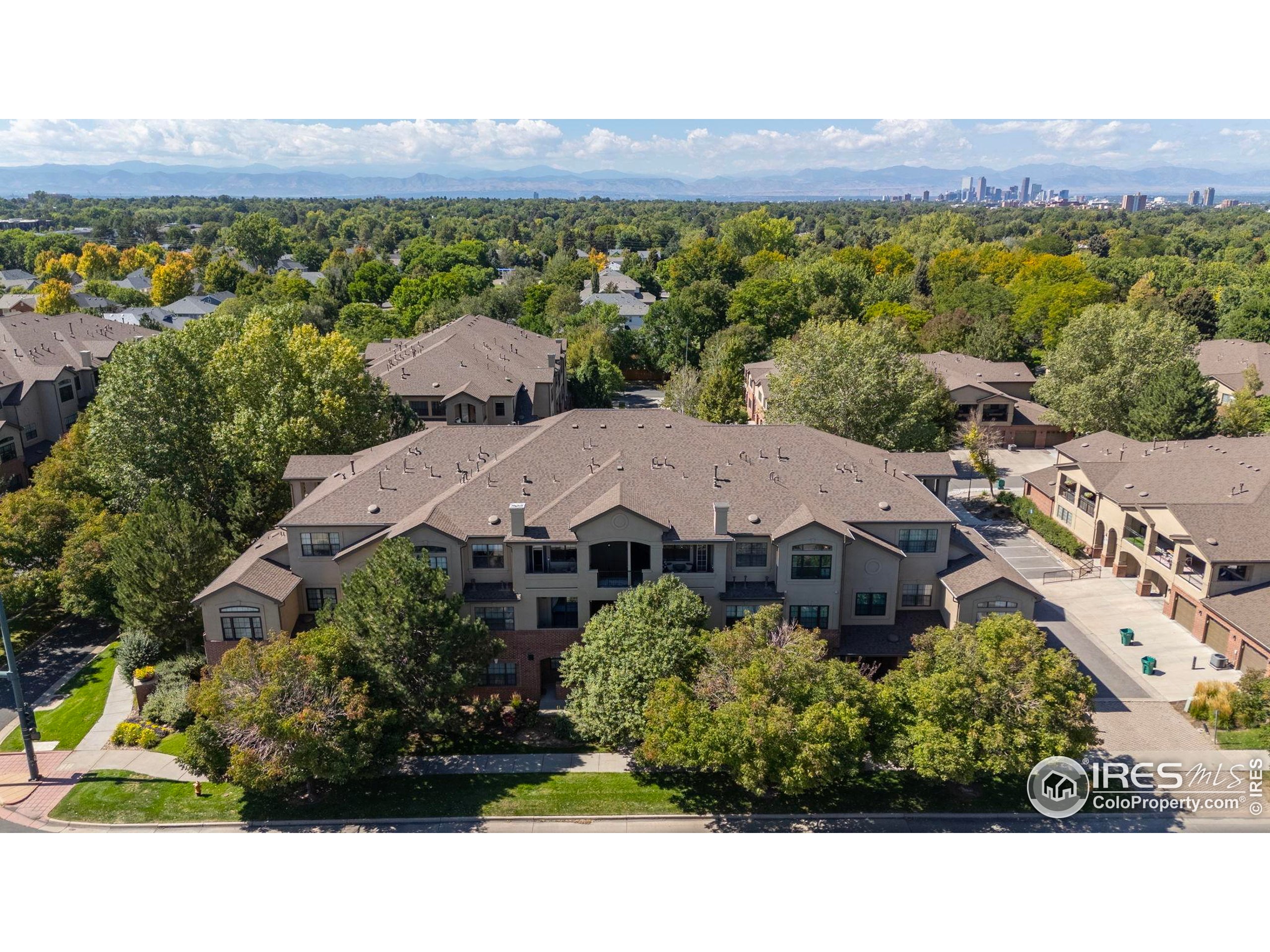 209 Quebec Street, Unit L Denver, CO 80220 - Photo 3 of 46 a view of a house with a garden