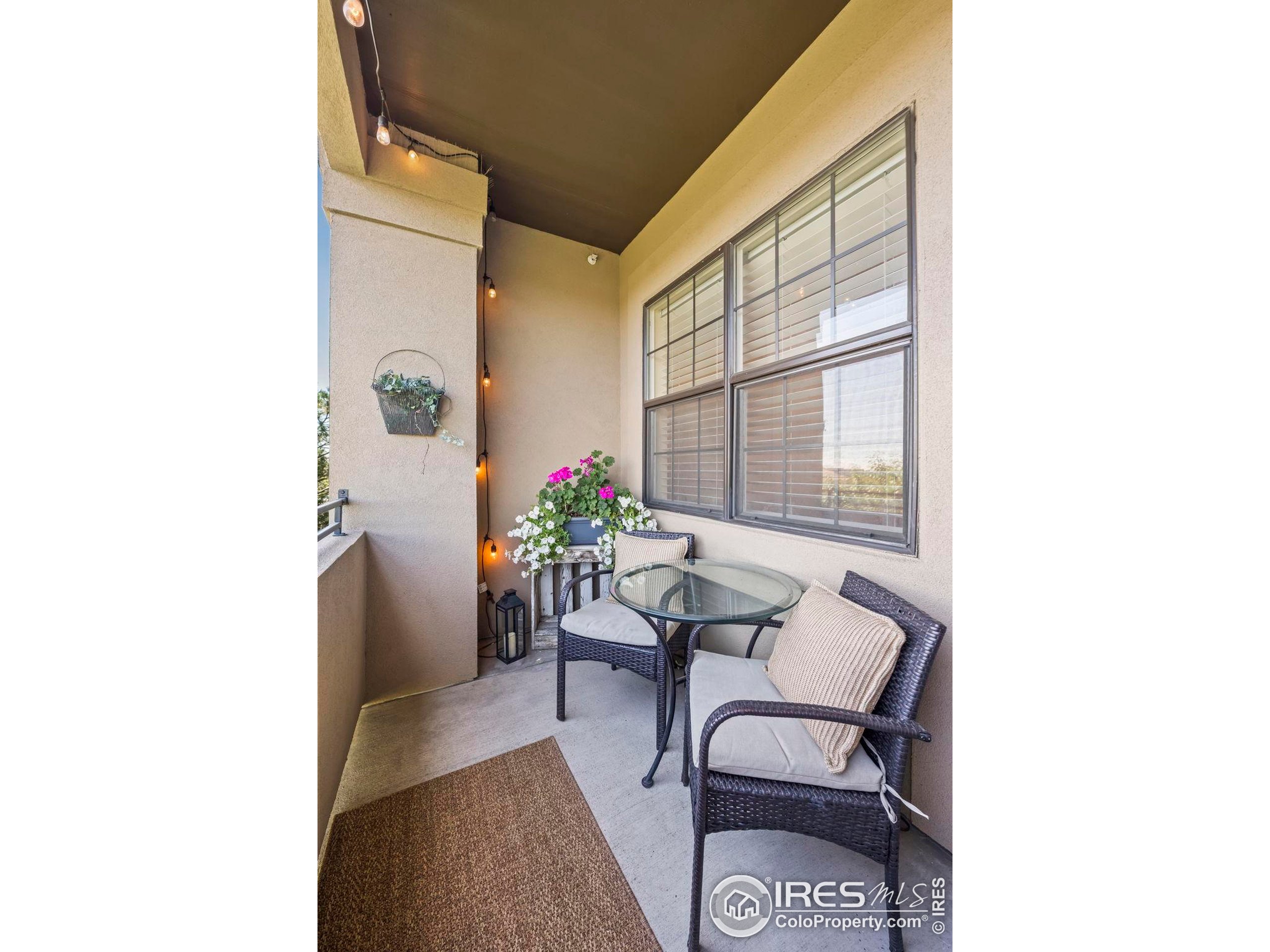 209 Quebec Street, Unit L Denver, CO 80220 - Photo 10 of 46 a view of a room with furniture and front door