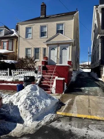 a view of house with outdoor space