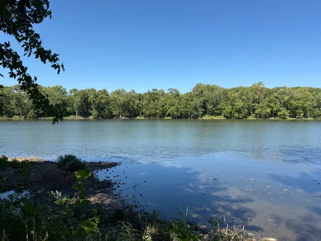 a view of a lake with a mountain in the background