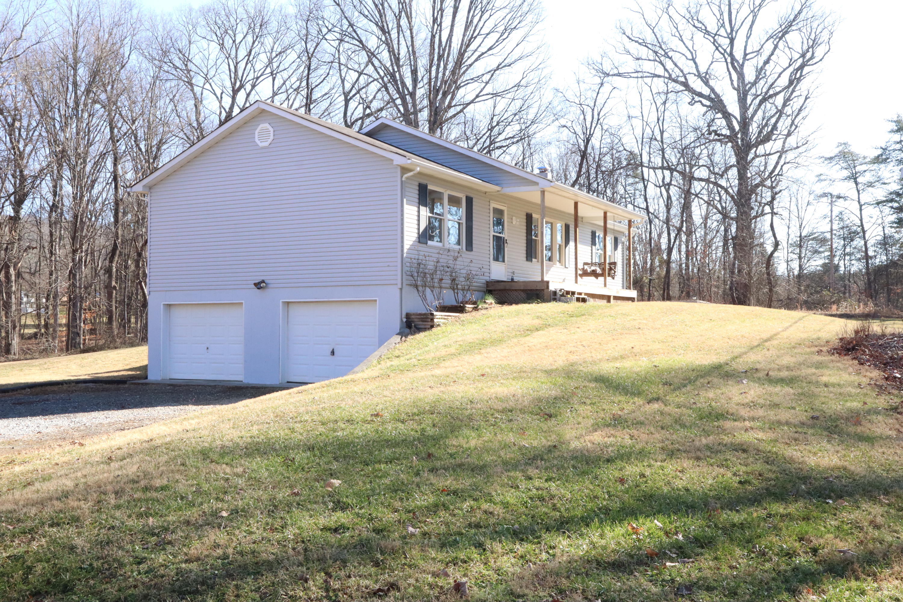 2664 Rutrough Road Southeast Roanoke, VA 24014 - Photo 12 of 19 a view of a house with a yard covered in snow