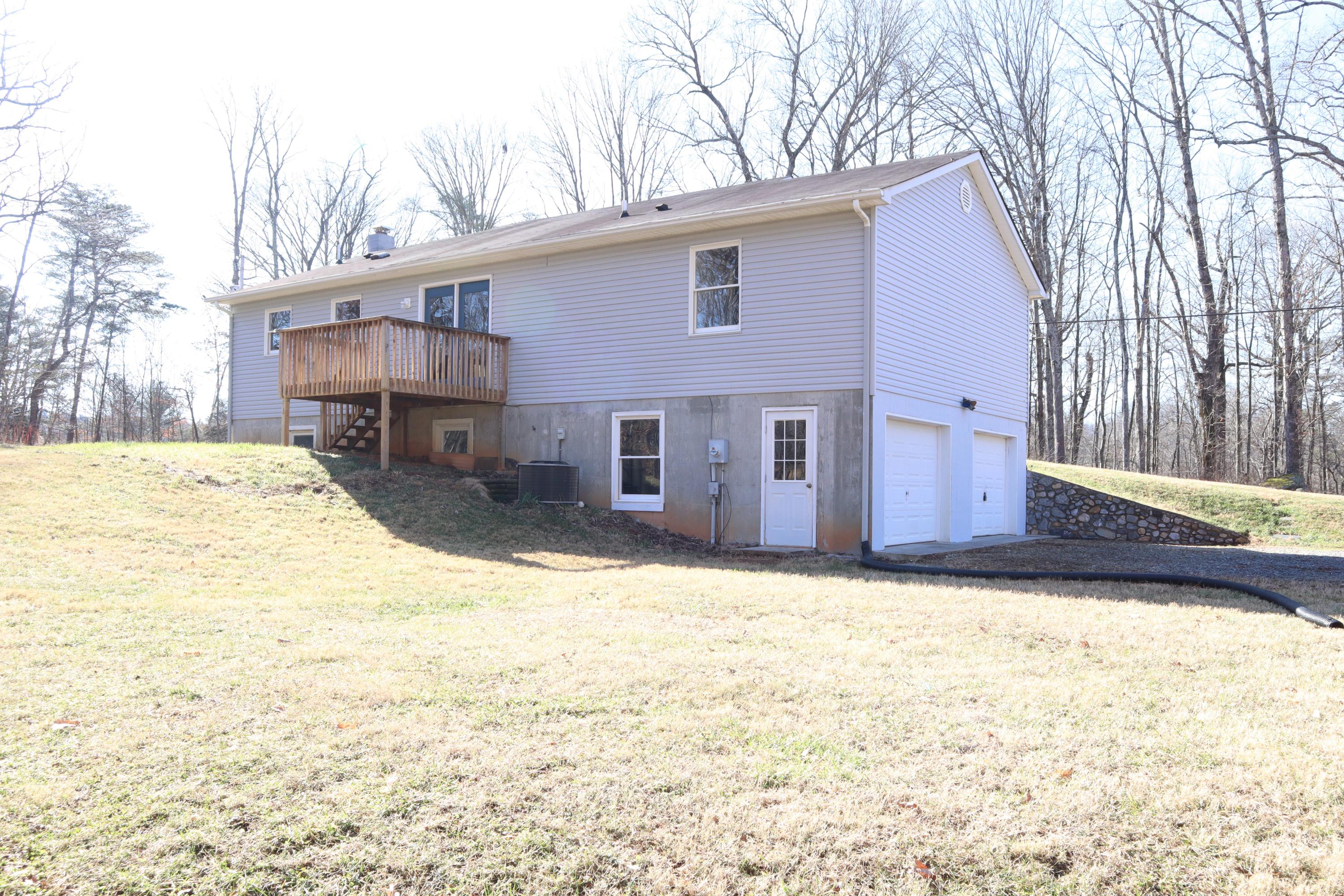 2664 Rutrough Road Southeast Roanoke, VA 24014 - Photo 18 of 19 a view of a house with snow on the road