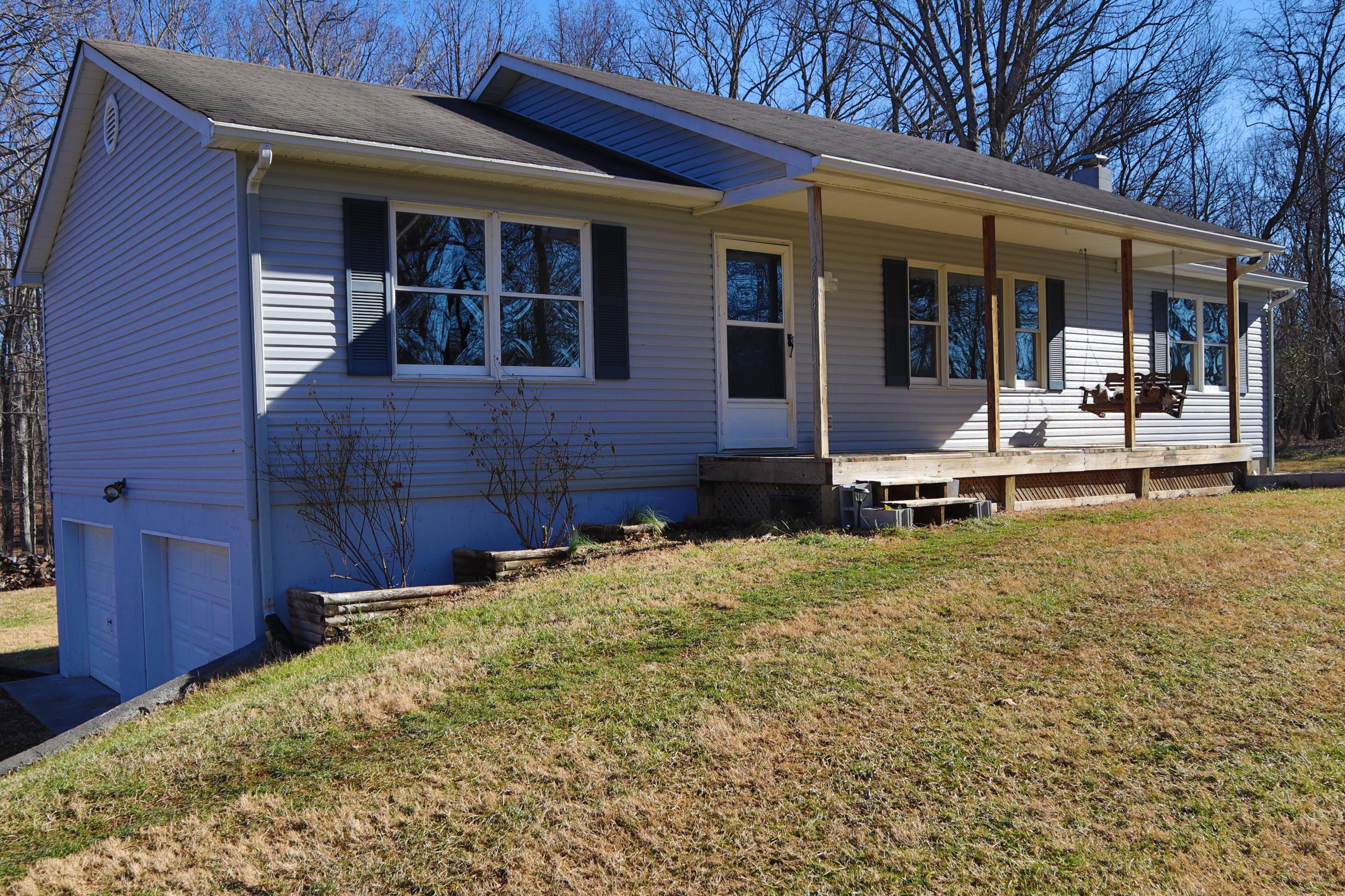 2664 Rutrough Road Southeast Roanoke, VA 24014 - Photo 19 of 19 a view of a house with a backyard