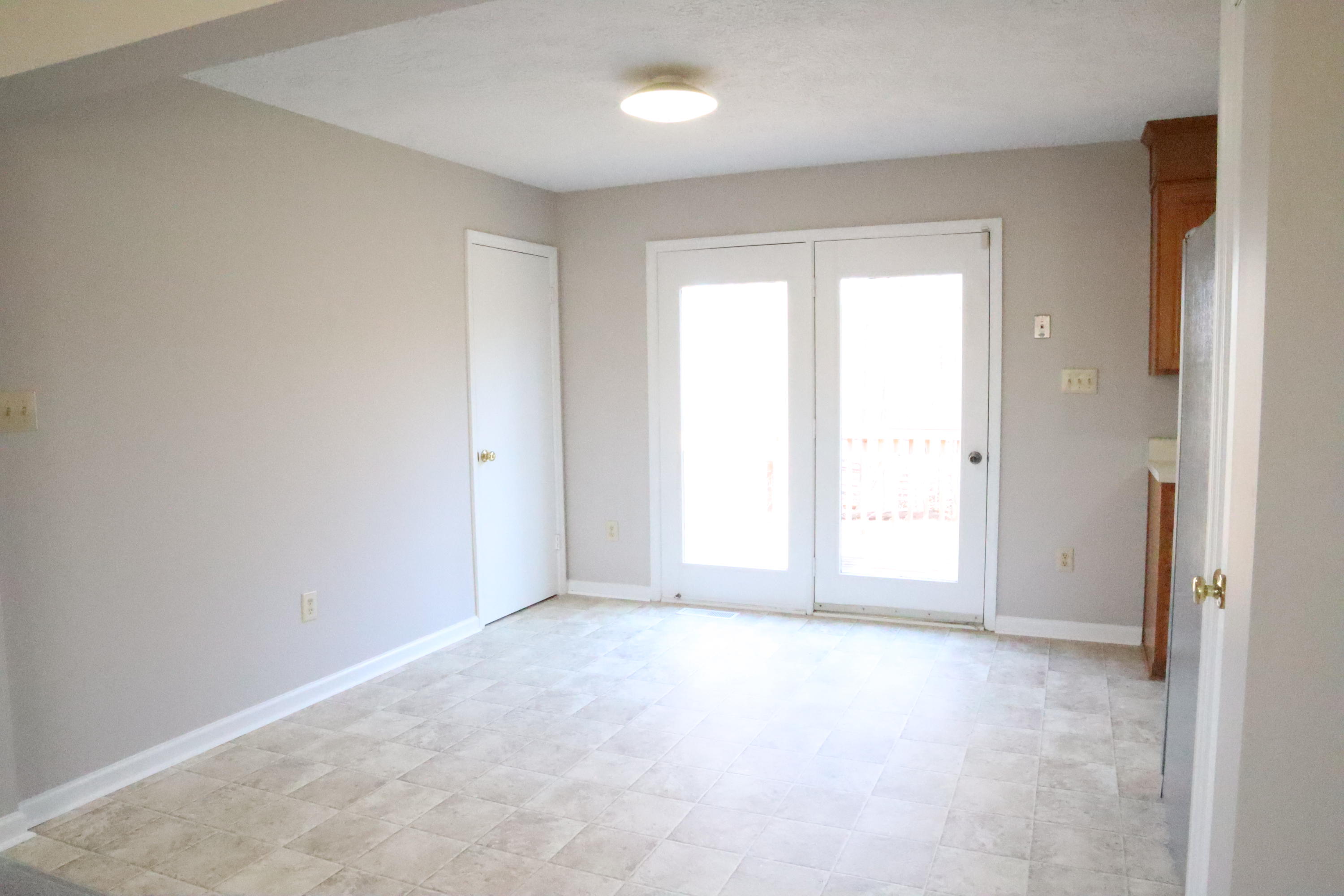 2664 Rutrough Road Southeast Roanoke, VA 24014 - Photo 3 of 19 an empty room with windows