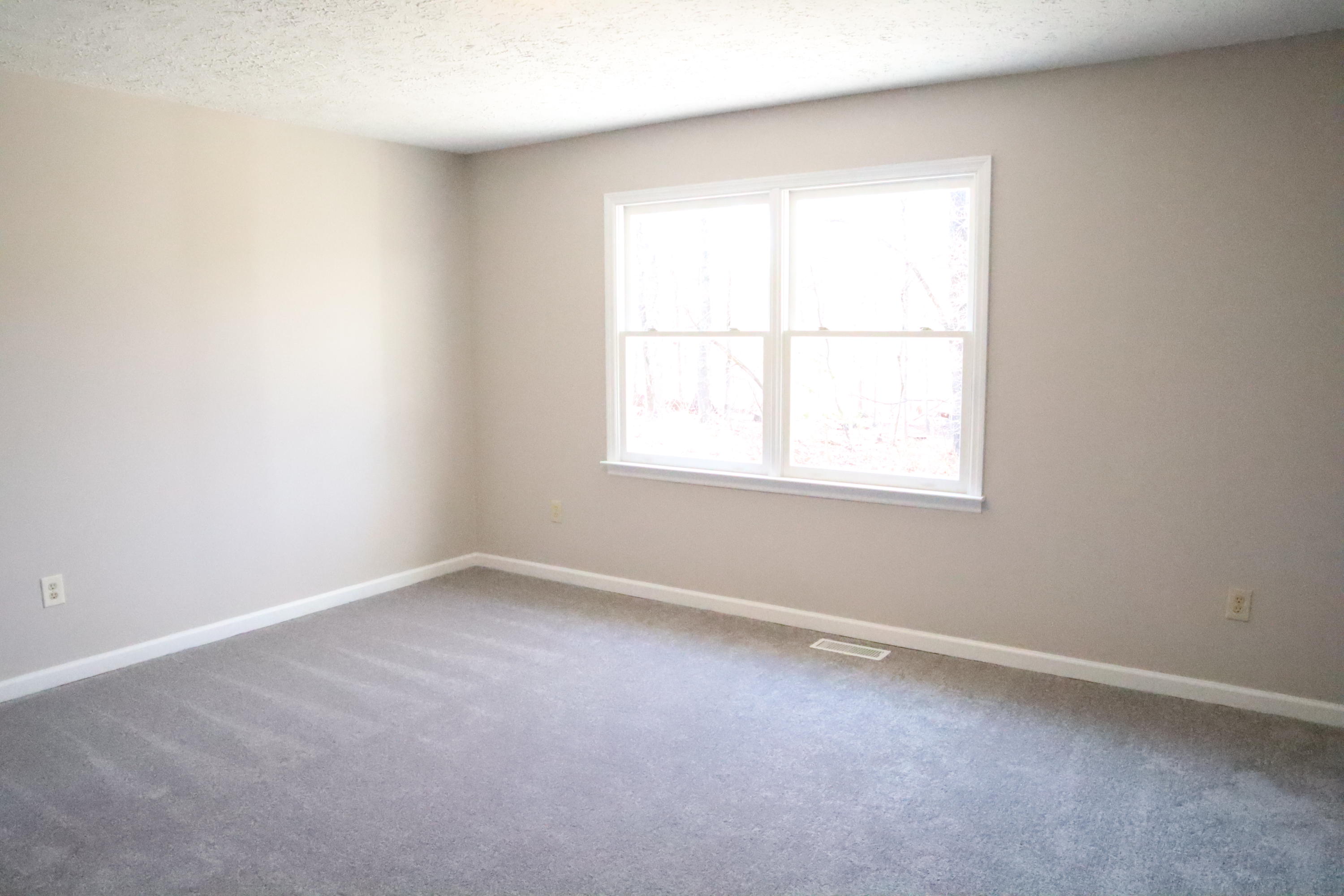 2664 Rutrough Road Southeast Roanoke, VA 24014 - Photo 7 of 19 an empty room with a window