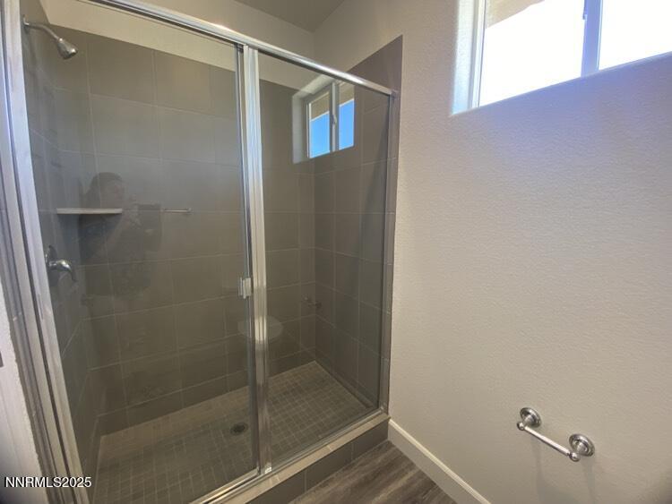 897 Agate Way Fernley, NV 89408 - Photo 6 of 8 a bathroom with a shower