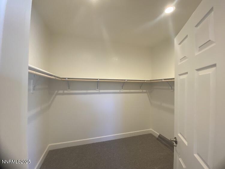 897 Agate Way Fernley, NV 89408 - Photo 7 of 8 a view of an empty walk in closet