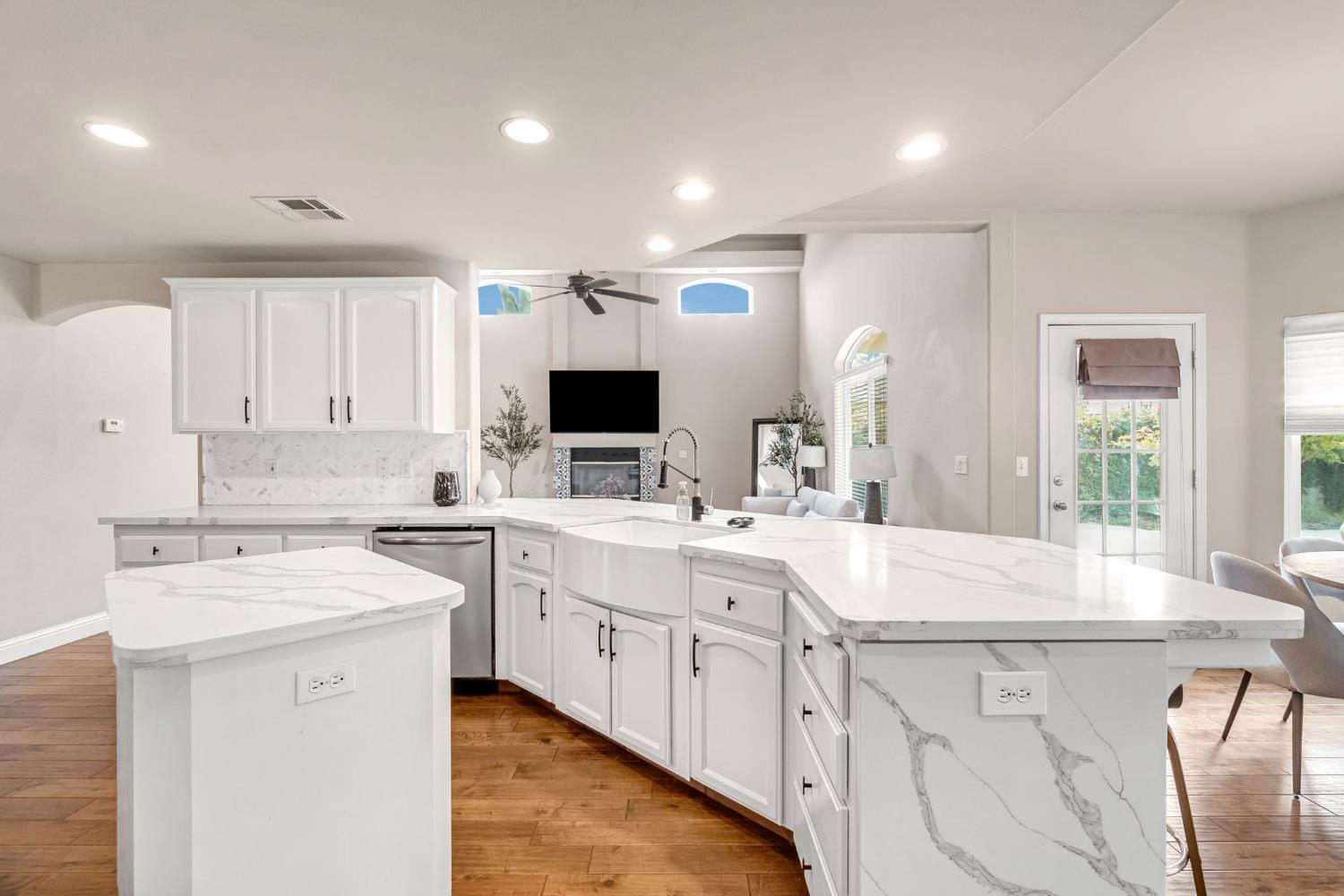 12 Breeze Way Madera, CA 93637 - Photo 15 of 56 a kitchen with a sink stove and cabinets