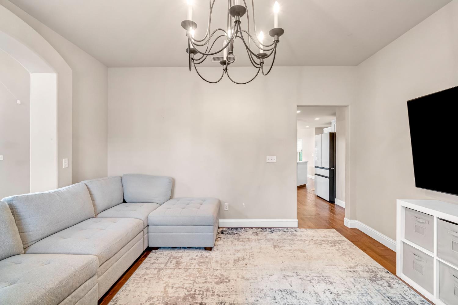 12 Breeze Way Madera, CA 93637 - Photo 20 of 56 a living room with furniture and a flat screen tv
