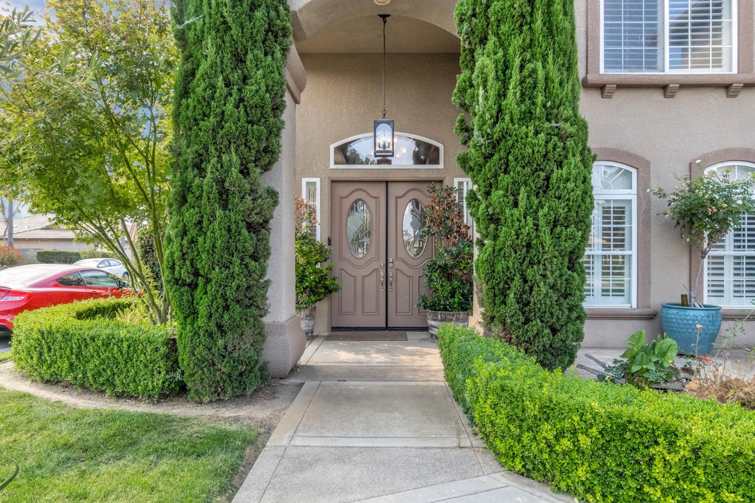 12 Breeze Way Madera, CA 93637 - Photo 2 of 56 a front view of a house with garden