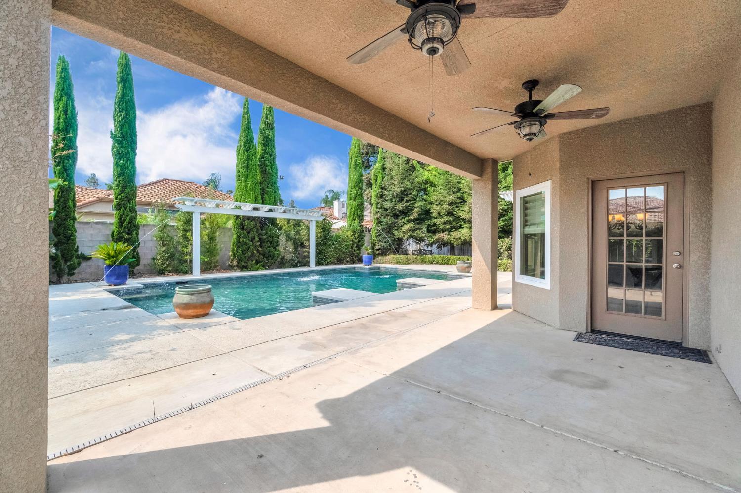12 Breeze Way Madera, CA 93637 - Photo 47 of 56 a view of a porch with furniture and a yard