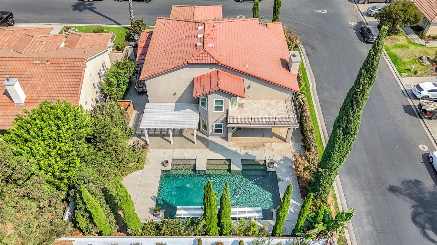 12 Breeze Way Madera, CA 93637 - Photo 49 of 56 an aerial view of a house with swimming pool