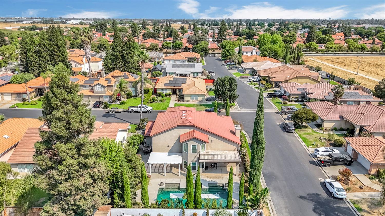 12 Breeze Way Madera, CA 93637 - Photo 51 of 56 an aerial view of residential houses with outdoor space