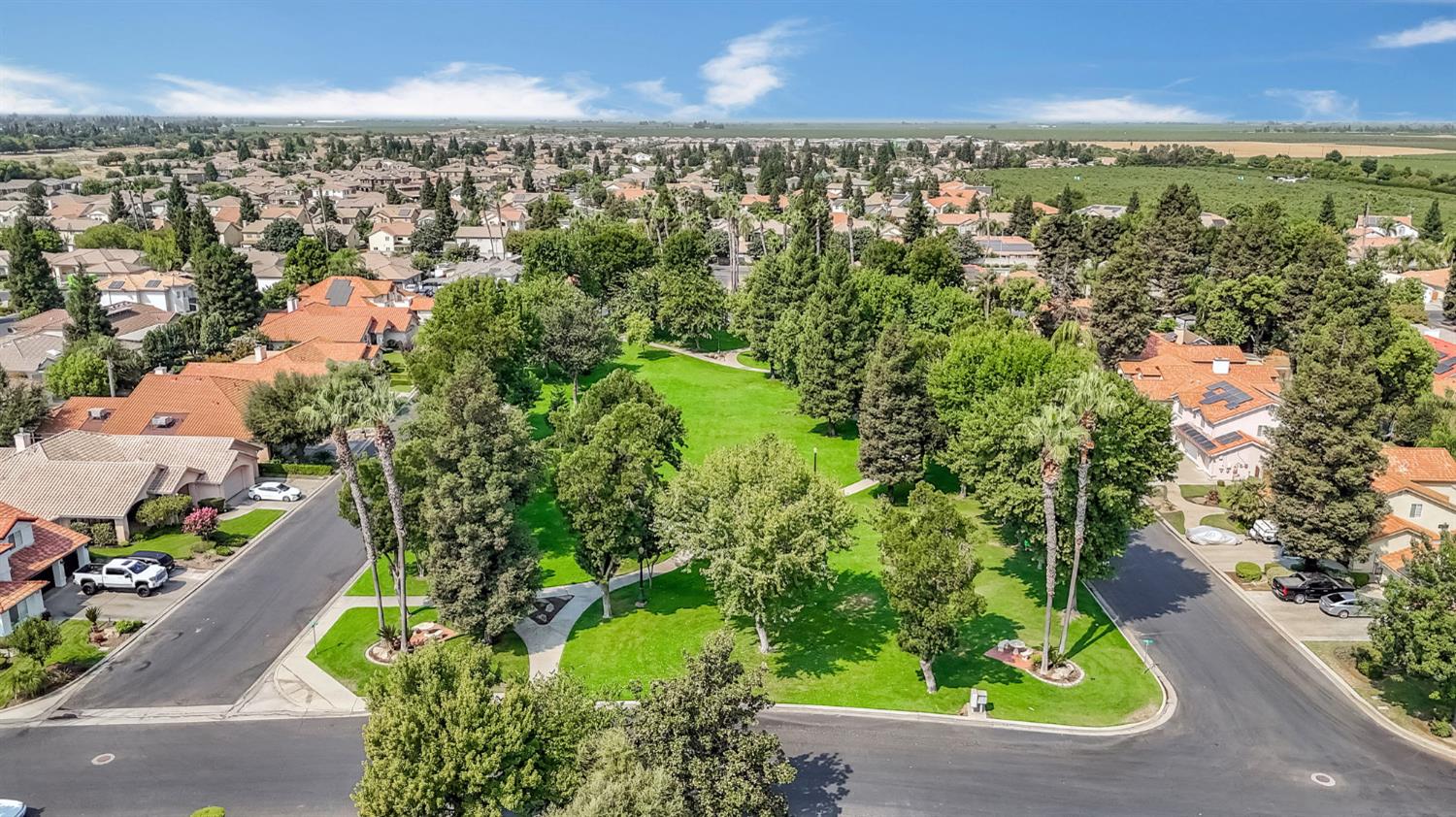 12 Breeze Way Madera, CA 93637 - Photo 56 of 56 an aerial view of residential building and green space