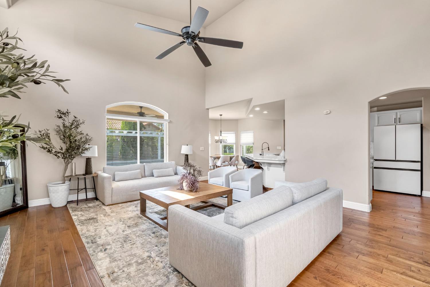 12 Breeze Way Madera, CA 93637 - Photo 7 of 56 a living room with furniture and a large window