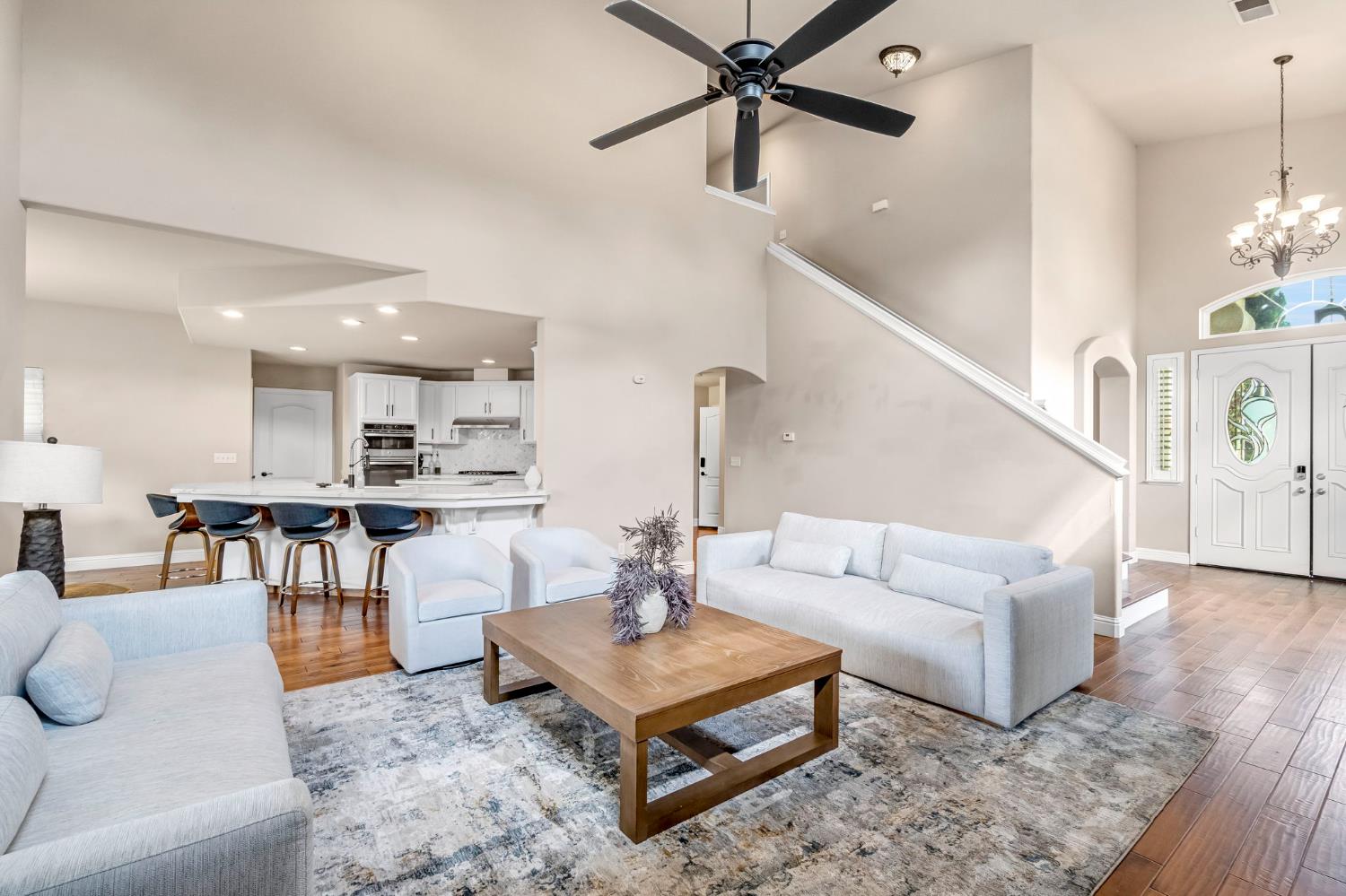 12 Breeze Way Madera, CA 93637 - Photo 9 of 56 a living room with furniture and a view of kitchen
