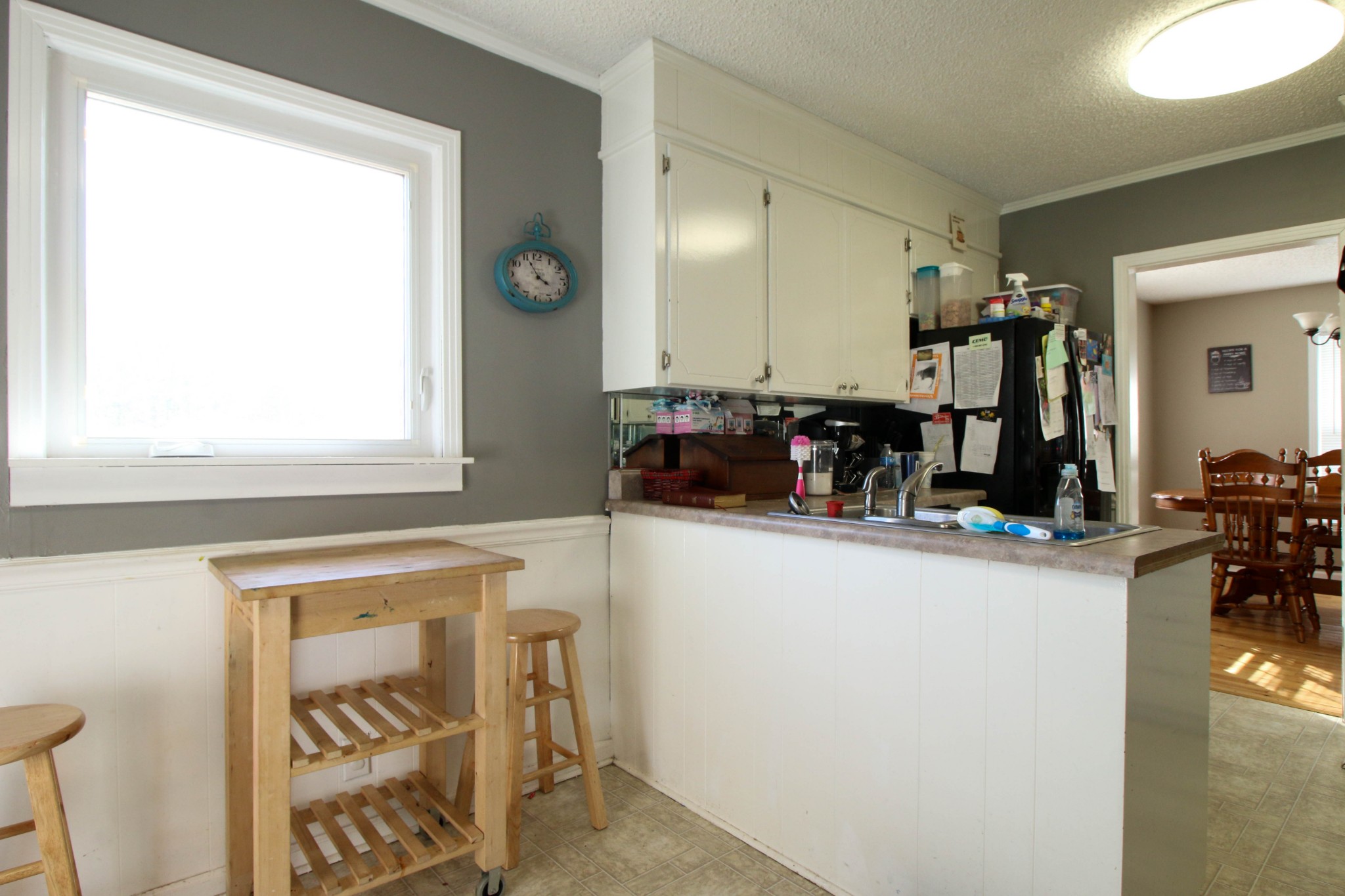 197 South Leath Road Portland, TN 37148 - Photo 11 of 14 a kitchen with a refrigerator and a table