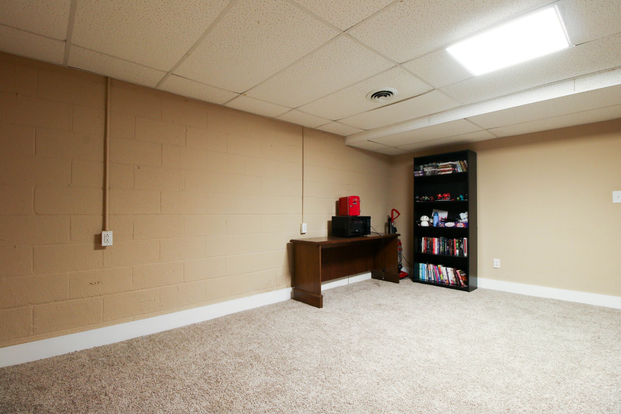 197 South Leath Road Portland, TN 37148 - Photo 13 of 14 a view of store room with cabinet and window