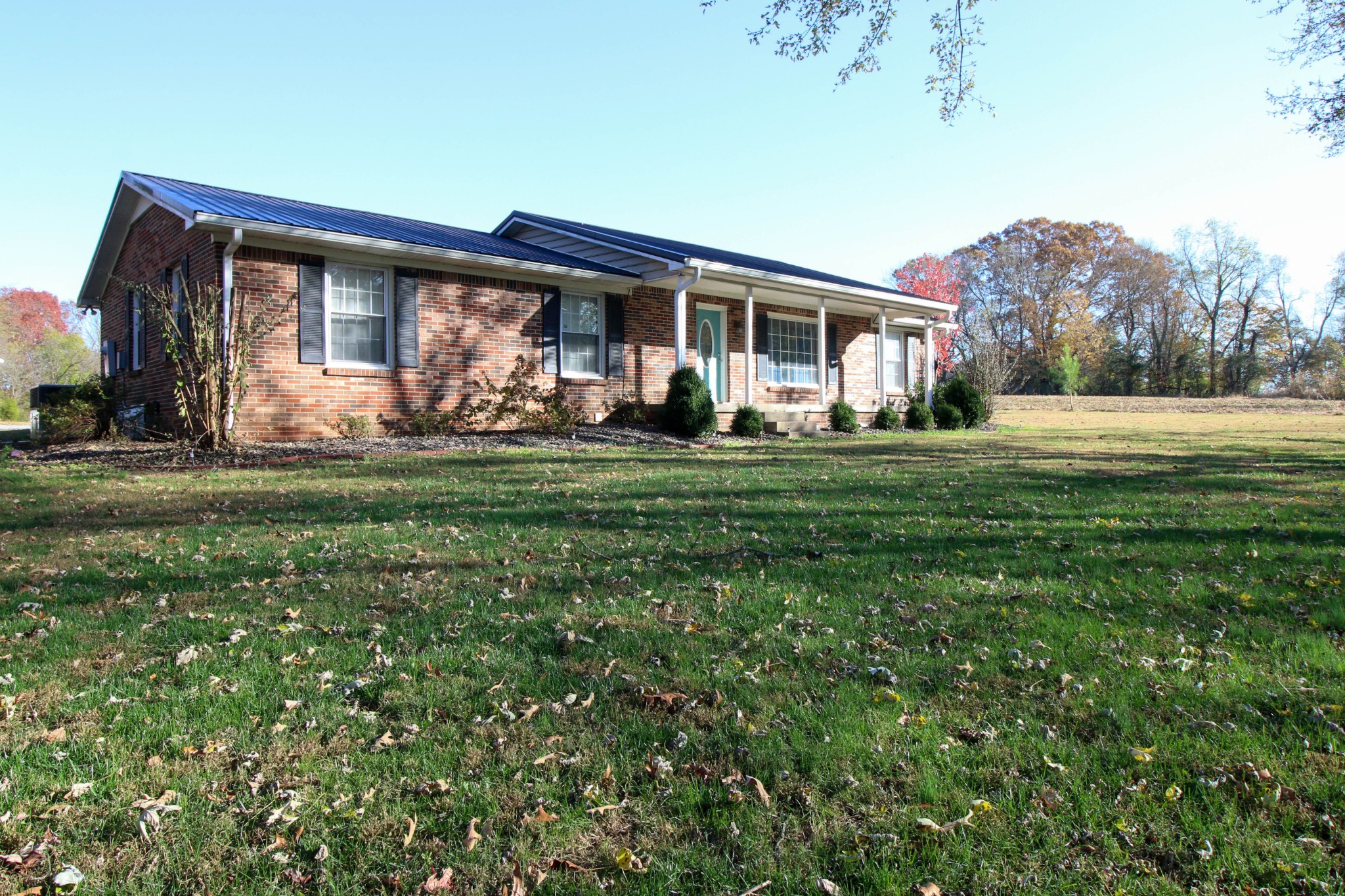 197 South Leath Road Portland, TN 37148 - Photo 3 of 14 a front view of a house with a garden