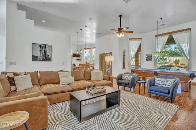 a very nice looking dining room with a table and chairs