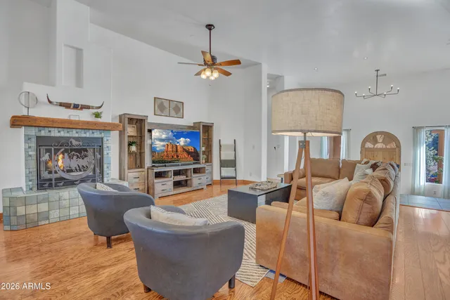a kitchen with a sink window and cabinets