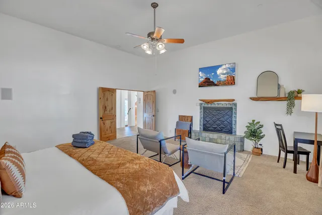 a bedroom with a bed and walk in closet