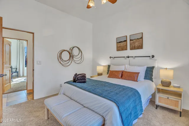 a view of a patio with a table and chairs