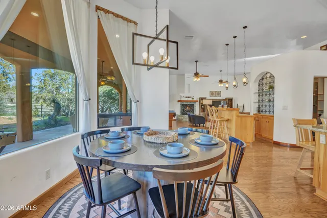 a view of a livingroom with furniture and windows