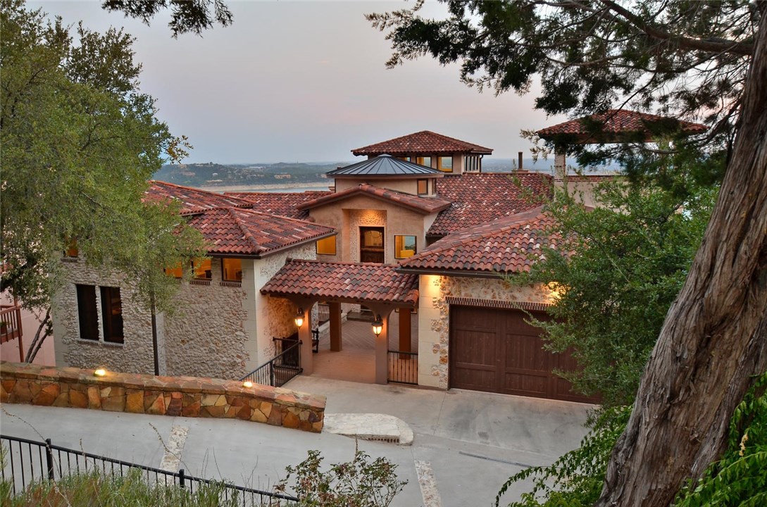 6901 Mountain Trail Austin, TX 78732 - Photo 1 of 1 a front view of a house with yard