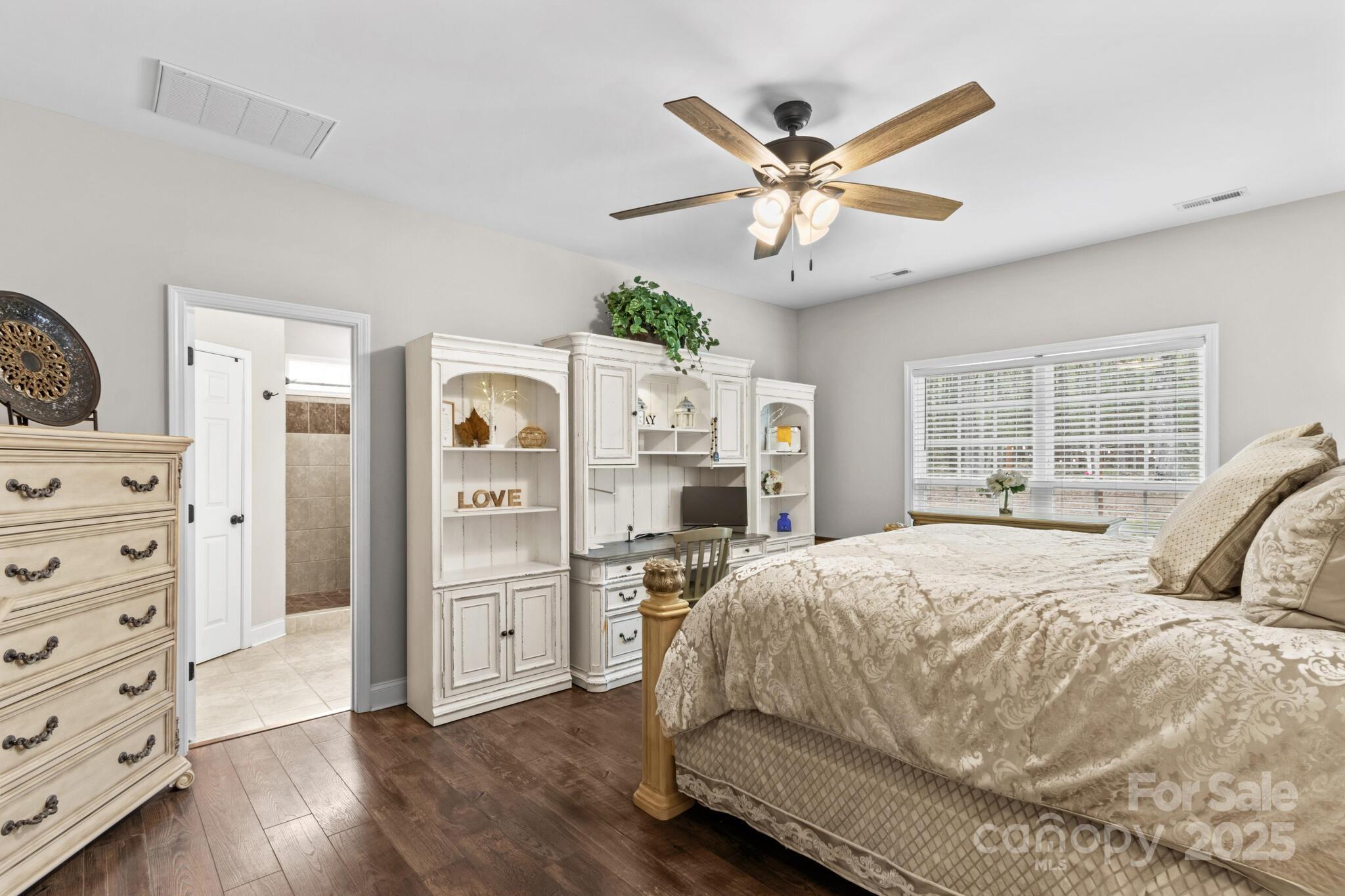 9060 Castor Road Salisbury, NC 28146 - Photo 23 of 47 a bedroom with a large bed and a window