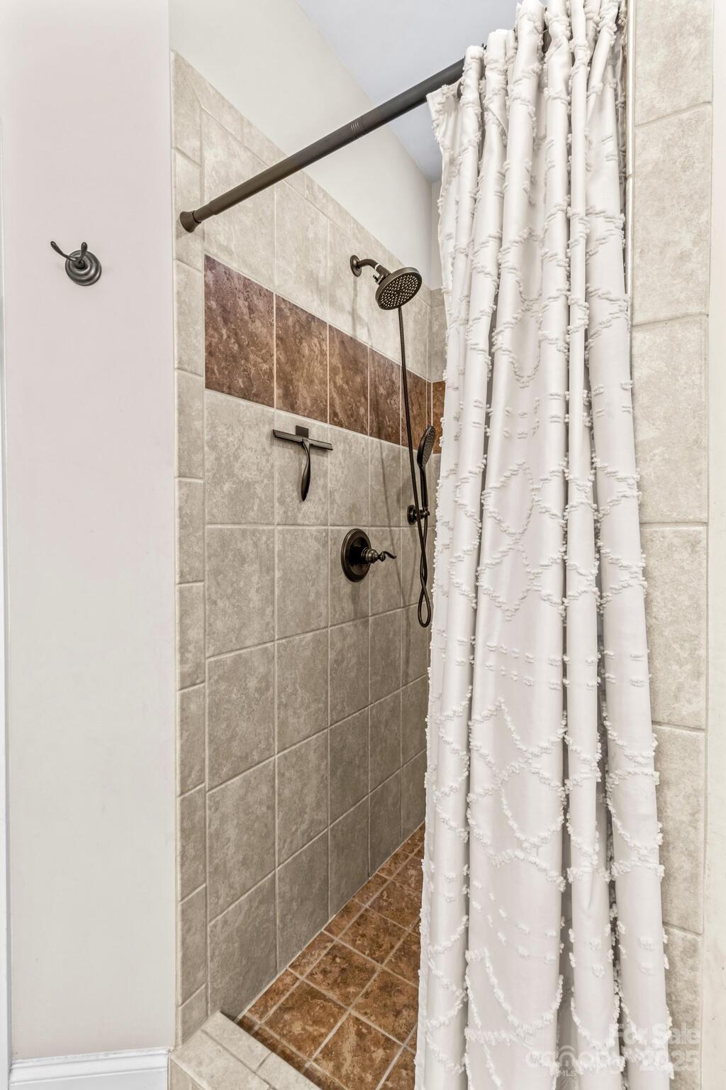 9060 Castor Road Salisbury, NC 28146 - Photo 28 of 47 a bathroom with a shower