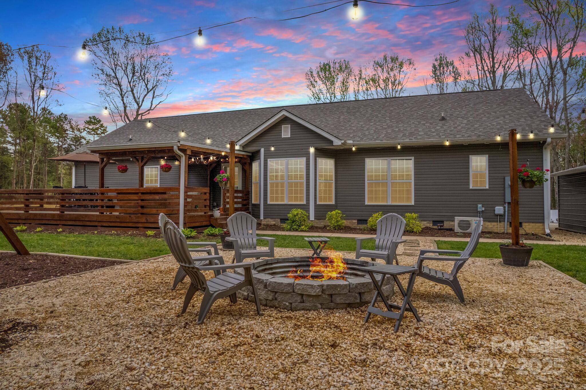 9060 Castor Road Salisbury, NC 28146 - Photo 45 of 47 a view of a house with backyard porch and sitting area