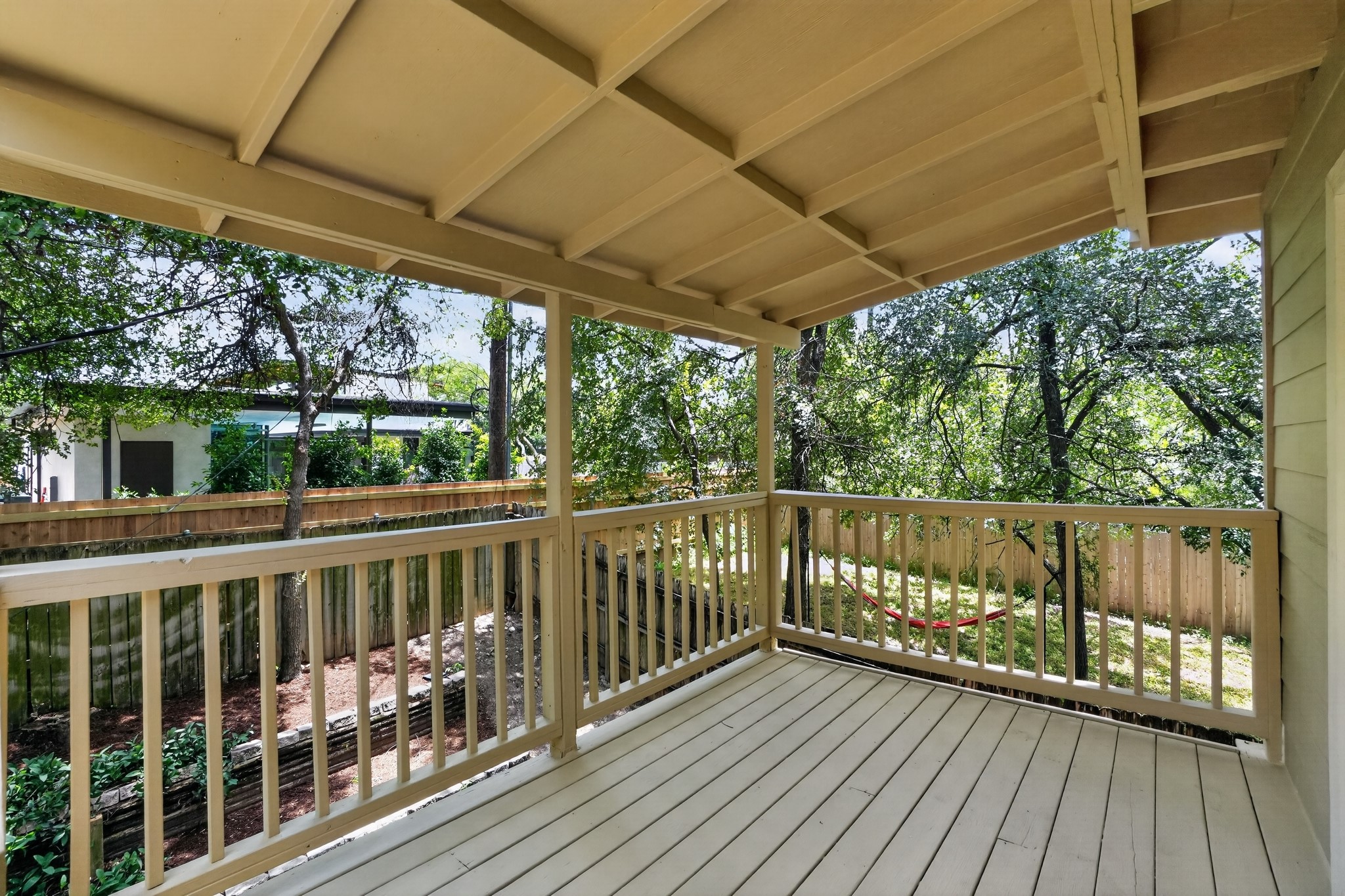 2113 Rabb Road Austin, TX 78704 - Photo 12 of 35 Covered deck right outside kitchen & dining, Side B